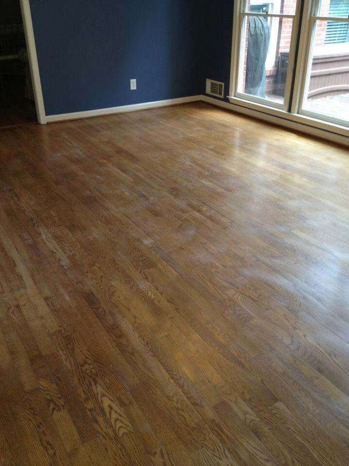 a very lightly damaged hardwood floor
